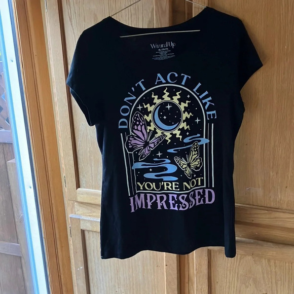 Wound Up graphic tee shirt XL (15-17) Design shows off on the black background. - Picture 1 of 6